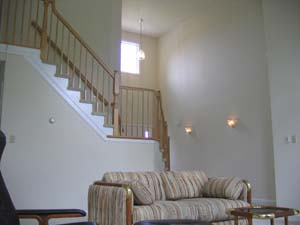 staircase in living room, toward foyer